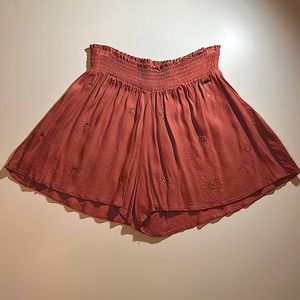 shorts, PINK stretchy waistband but flowey legs